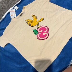 Gucci Cream Tee with Yellow Bird and Pink Apple Graphic